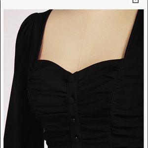 Rouged front peplum top